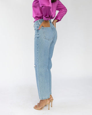 JO+CO Amari Midrise Skater Denim jeans in light wash denim with a knee slit and relaxed fit.