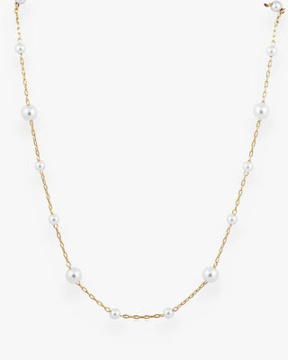 JO+CO delicate gold chain choker necklace with scattered small white pearls. Adjustable length.