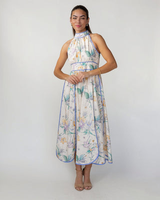 JO+CO cream floral print midi dress with halter neckline, smocked waist, and contrast blue binding. Lightweight cotton.